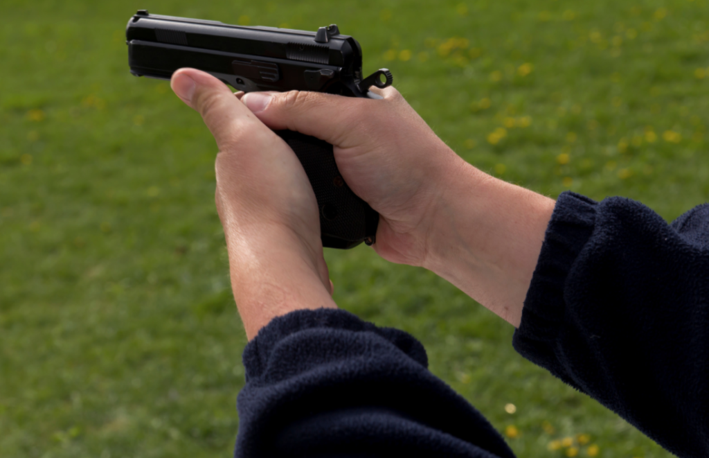 Active shooter holding a hand gun
